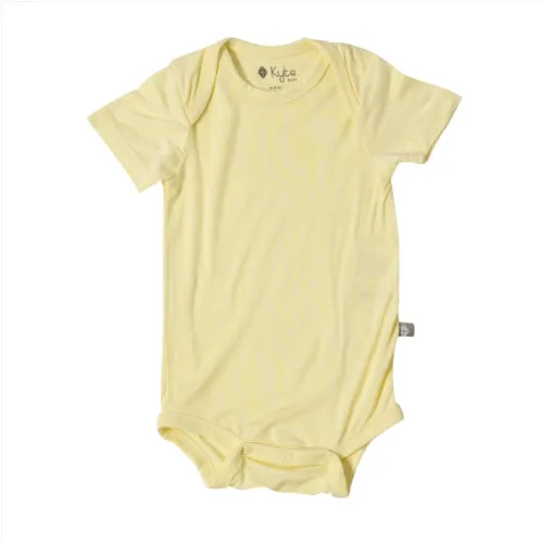Kyte Baby onesie in canola 0-3m
